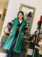 KNITTED JACKET SLEEVELESS
